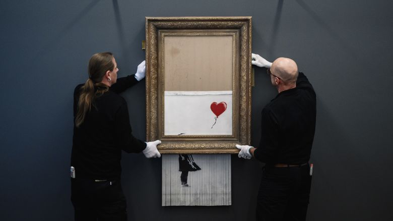 BADEN-BADEN, GERMANY - FEBRUARY 04: Banksy's "Love In The Bin" is on view to the public at Museum Frieder Burda on February 4, 2019 in Baden-Baden, Germany. Originally titled "Girl with Balloon", the canvas passed through a hidden shredder seconds after the hammer fell at Sotheby's Contemporary Art Evening Sale on October 5, 2018 in London, making it the first artwork in history to have been created live during an auction. The Museum Frieder Burda will show the artwork for the first time outside of the UK from February 5 until March 3, 2019. (Photo by Alexander Scheuber/Getty Images)