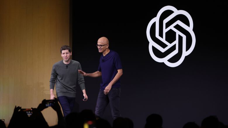 Microsoft CEO Satya Nadella (R) greets OpenAI CEO Sam Altman during the OpenAI DevDay event on November 06, 2023 in San Francisco, California. Altman delivered the keynote address at the first-ever Open AI DevDay conference.